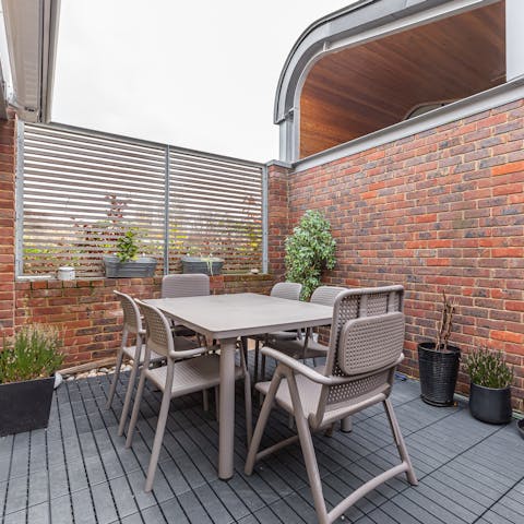 Sip a glass of wine out on the private terrace