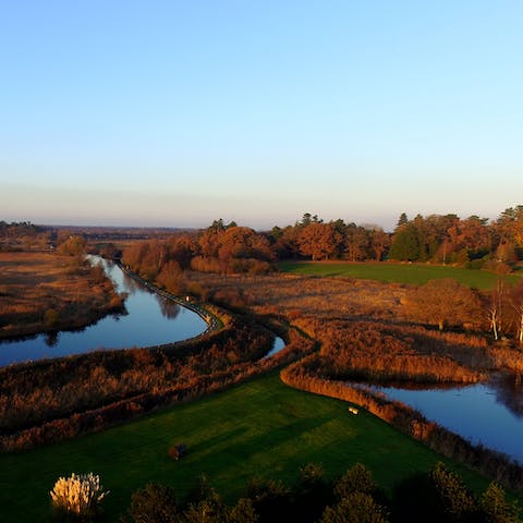 Explore the Norfolk Broads via Wroxham – an eleven-minute drive away