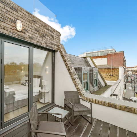 End the day on the balcony with a glass of something chilled in hand