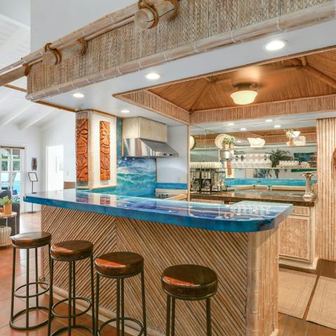 Make your favourite cocktail in the tiki bar