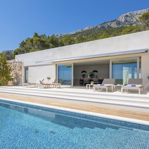 Stay active in the private pool and catch some sun on the poolside loungers