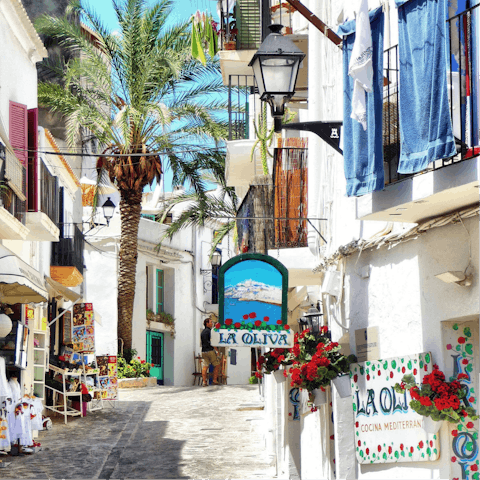 Soak up the island buzz from Ibiza Town – a short drive away