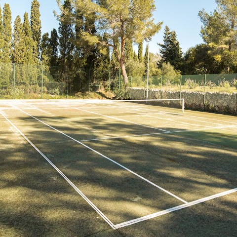 Enjoy energising games of tennis on the private court