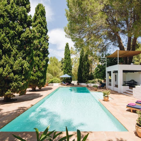 Find peace and relaxation while lounging by the pool