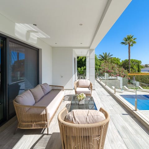 Enjoy a glass of Vinho Verde on the balcony