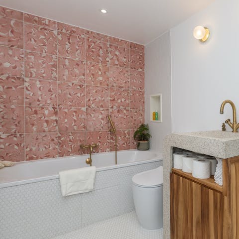 Soak all night in the stylish tub with a glass of pinot noir