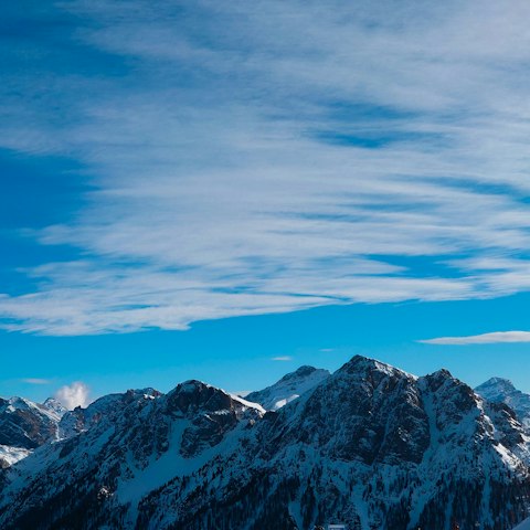 Reach Kronplatz's peak for breathtaking Dolomite panoramas, a nineteen-minute drive