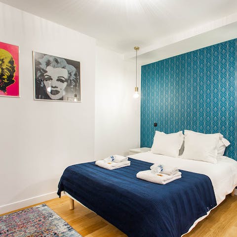 Wake up and feel inspired by the cinematic ambience of this stylish apartment