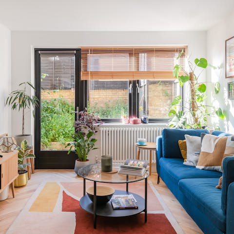 Open the glass door and relax in the home's garden area on warm days