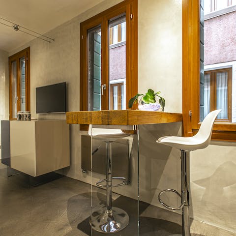 Start mornings with espressos and fresh pastries at the bar-style table