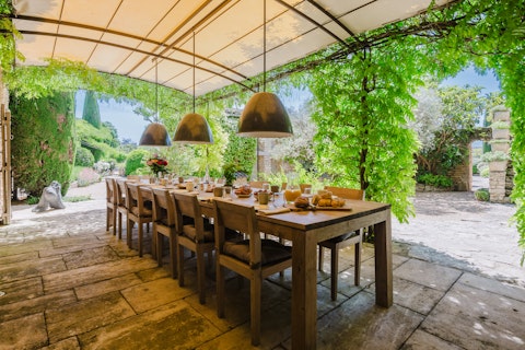Feast together in the shade of the terrace