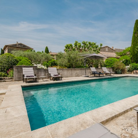 Cool off in the private pool while the kids play on the trampoline
