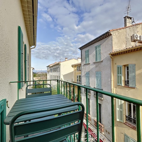 Sip red wine while admiring the old town view