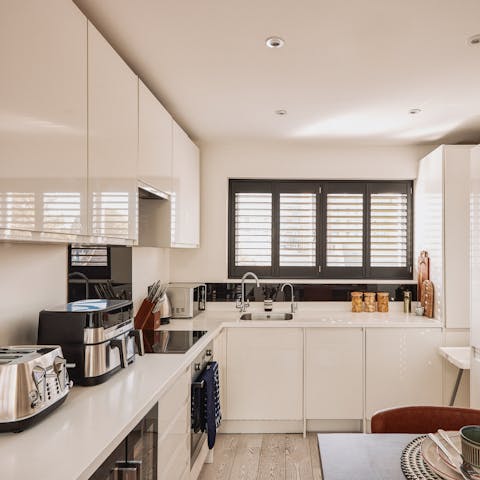 Rustle up a delicious dinner in the sleek, modern kitchen