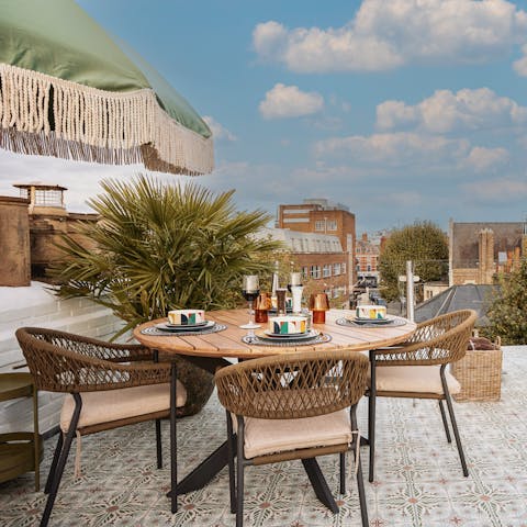 Enjoy alfresco meals on the rooftop terrace