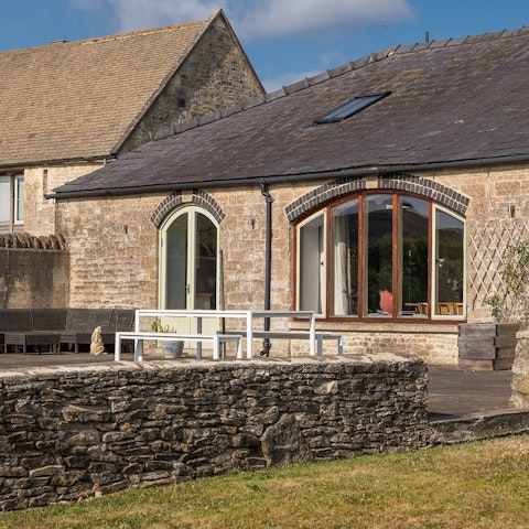 Stay in a typical Cotswold stone barn, full of original features