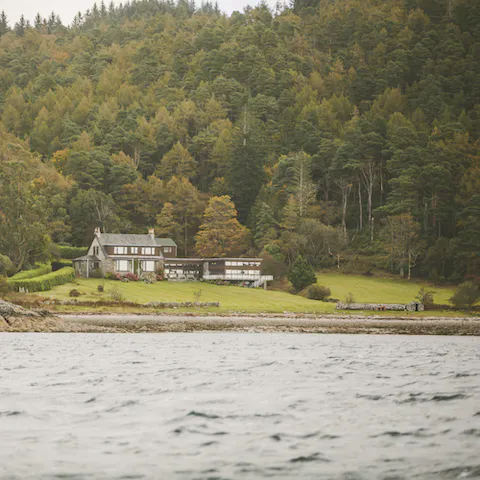 Stroll around the beautiful grounds and near the loch