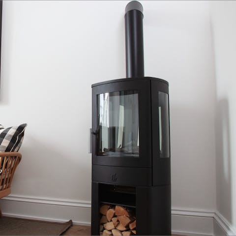 Curl up by the electric fireplace with a whisky