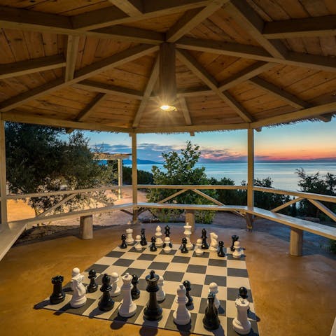 Challenge loved ones to a game of giant chess in the communal games area