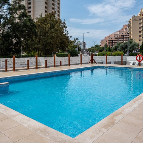 Nip down to the building's shared pool for a few laps before breakfast