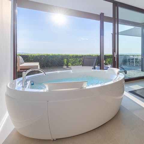 Enjoy the indoor jacuzzi with impressive views