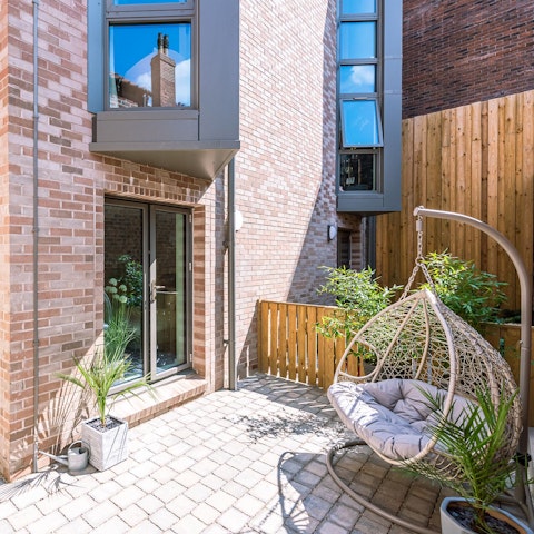 Spend sunny summer days gently swaying in the swing chair