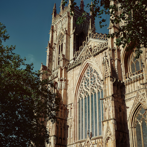 Gaze up in wonder at the beauty of York Minster, one of the world's most eye-catching cathedrals is just a five-minute walk away