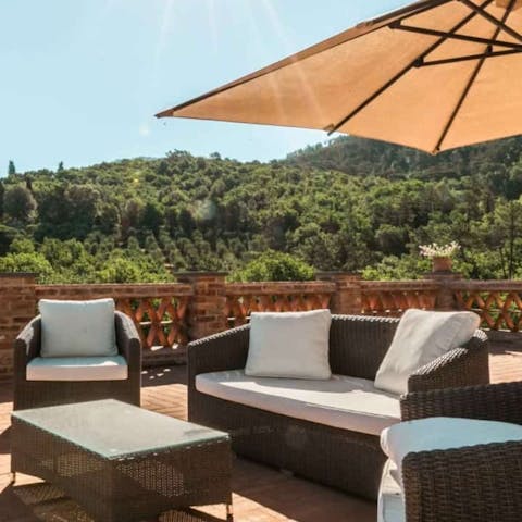 Enjoy the outdoor chill-out spots with a drink in hand