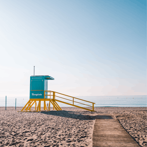 Wander 450 metres to the beach and sprawl out on the sand