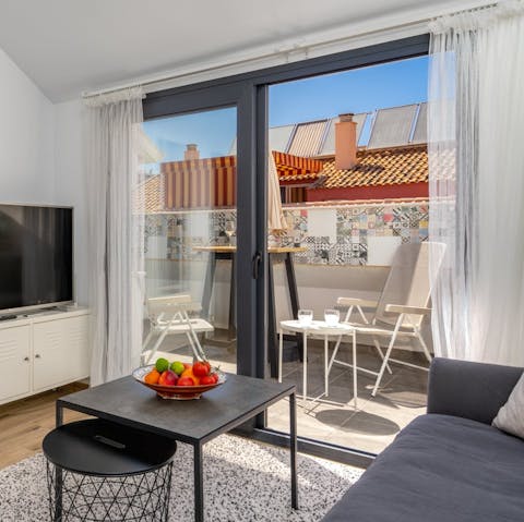 Take a glass of wine out to the balcony and admire the views