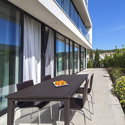 Enjoy a traditional Croatia breakfast of polenta and cornbread out in the sun