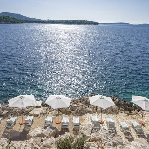 Spend the afternoon down by the beach – just a pebble's throw from the home