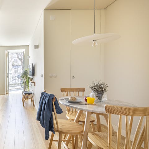 Start mornings off with a coffee and pastel de nata at the sunny, Scandi table