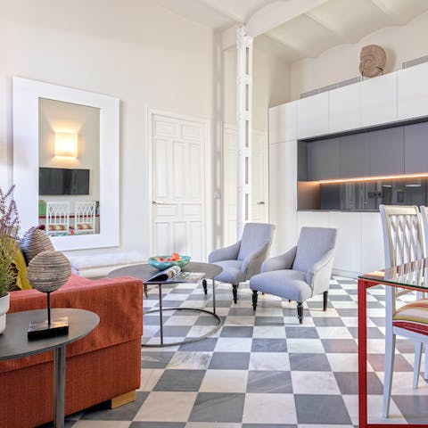 Enjoy a warm welcome from the stylish living room
