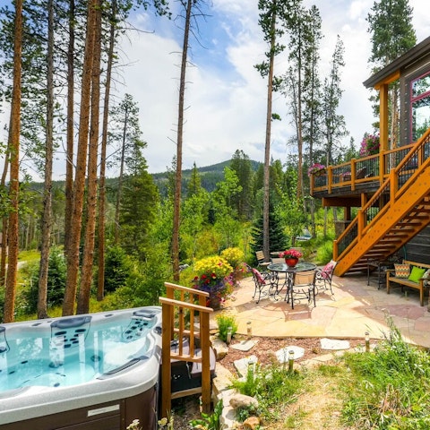 Unwind in the jacuzzi and admire the views of the Breckenridge mountains