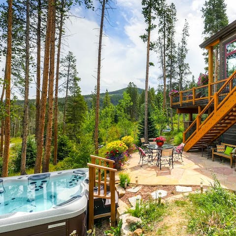 Unwind in the jacuzzi and admire the views of the Breckenridge mountains