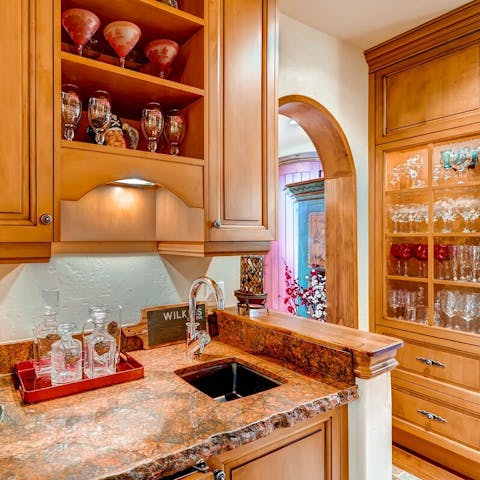 Fix yourself a tipple in the outfitted wet bar