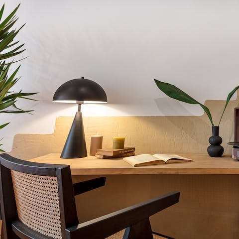 Catch up on work at the living area's desk space
