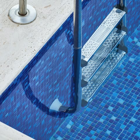 Enjoy a dip in the communal pool or amble through the shared garden