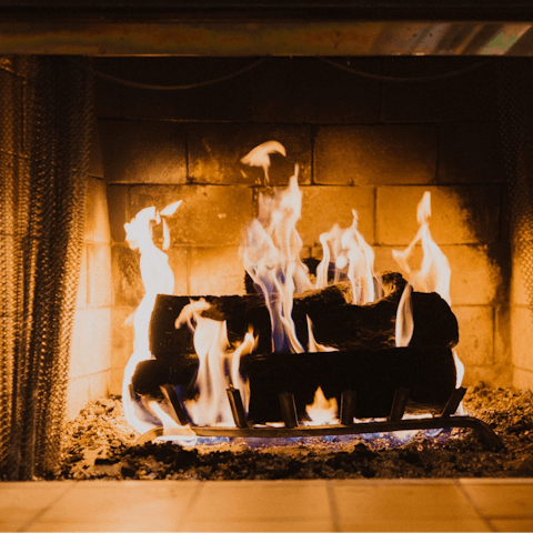 Spend cosy evenings cuddled up next to the fireplace