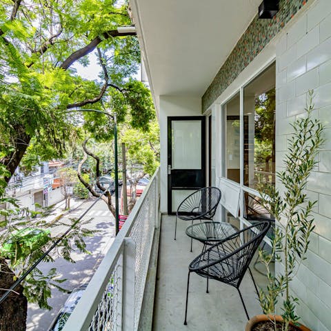 Enjoy your morning coffee on the private balcony