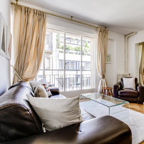 Bask in the natural light from floor-to-ceiling windows