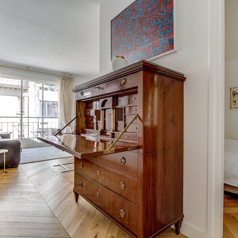 Open up the antique writer's desk and admire the craftmanship