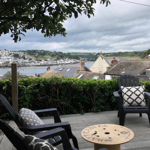 Make the most of long summer days out on the decking, with views over the estuary