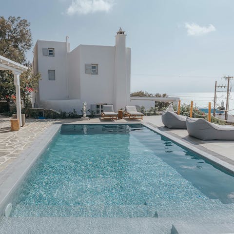 Slip from the bean bag sun lounger into the cool swimming pool