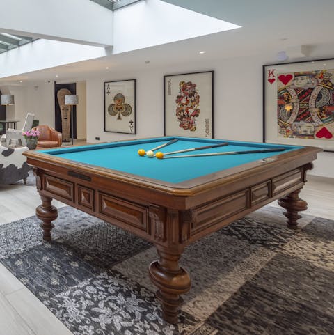 Play pool with other residents in the stylish lobby