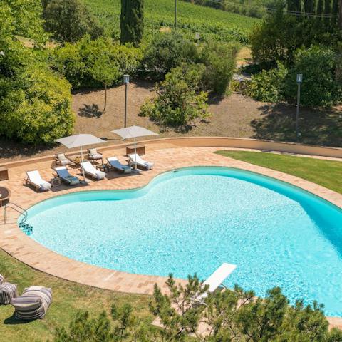 Dive into the heart-shaped swimming pool for a refreshing dip