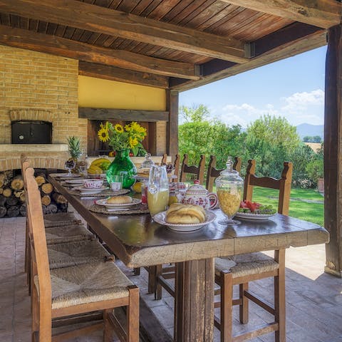 Cook pizza on the wood-fired oven for an alfresco feast
