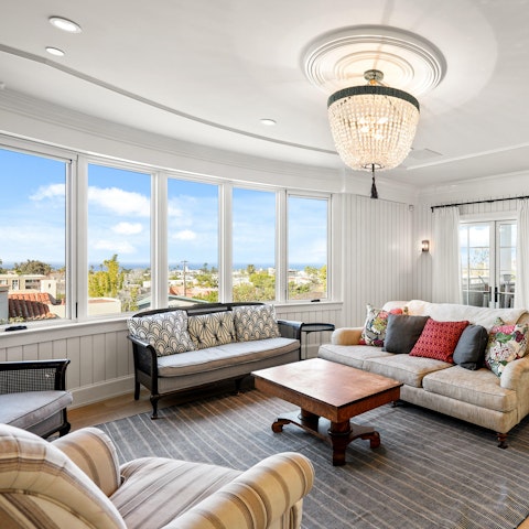 Relax in the comfy living room after a busy day at the beach