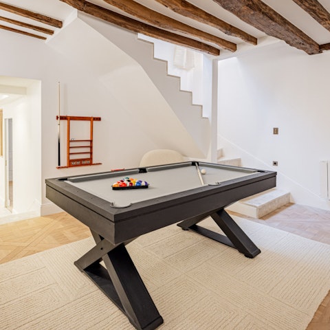 Shoot some pool in the games room